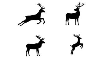Set of black silhouettes of reindeer Free Vector