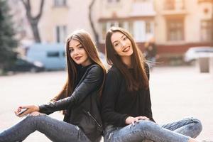 Two young adult girls photo