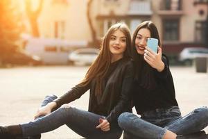 Two young adult girls photo