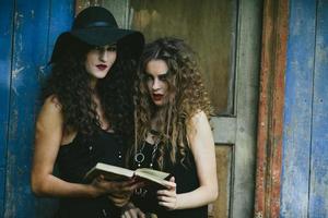 two vintage women as witches photo