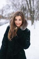 beautiful young girl posing on camera photo