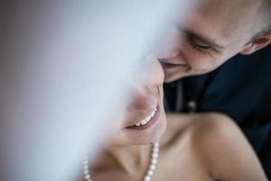 Beautiful European bridal couple in the hotel room photo