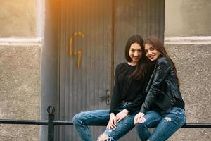 Two young adult girls photo