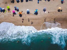 Beach with sun loungers on the coast of the ocean photo