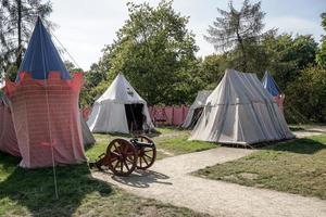 Warsaw, Poland, 2014. Old cannon and tents reconstruction at Wilanow Palace in Warsaw photo