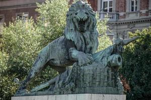 Budapest, Hungary, 2014. Statue of a Lion guarding the Margaret Bridge in Budapest photo