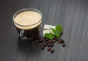 Espresso on wooden background photo