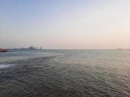 Beautiful evening at Jeddah, Corniche. The Jeddah Corniche, also known as the Jeddah Waterfront, is a coastal area of the city of Jeddah, Saudi Arabia. Located along the Red Sea. photo