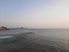 Beautiful evening at Jeddah, Corniche. The Jeddah Corniche, also known as the Jeddah Waterfront, is a coastal area of the city of Jeddah, Saudi Arabia. Located along the Red Sea. photo