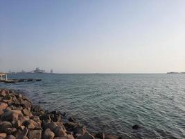 Beautiful evening at Jeddah, Corniche. The Jeddah Corniche, also known as the Jeddah Waterfront, is a coastal area of the city of Jeddah, Saudi Arabia. Located along the Red Sea. photo