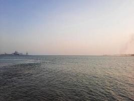 Beautiful evening at Jeddah, Corniche. The Jeddah Corniche, also known as the Jeddah Waterfront, is a coastal area of the city of Jeddah, Saudi Arabia. Located along the Red Sea. photo