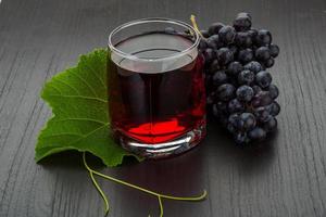 Grape juice and berries photo