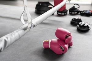 pink boxing gloves for girl and woman fight with copy space. photo