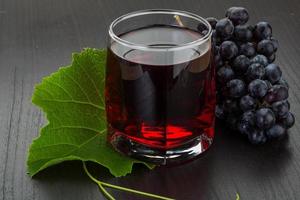 Grape juice and berries photo