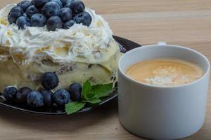 Coffee with blueberry cake photo