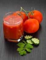 Gaspacho on wooden background photo
