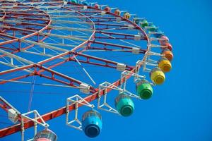 Ferris Wheel Over Blue Sky photo