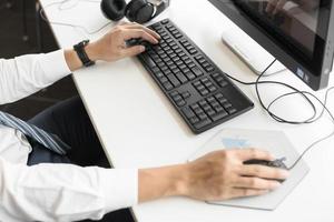 Businessman working on computer in office photo