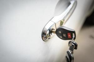 Car keys left in a lock photo