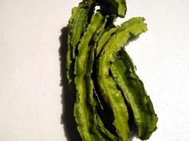 winged bean isolated on a white background. Plantae, Magnoliophyta, Magnoliopsida,Fabales,Fabaceae. photo