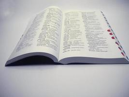 Depok, Indonesia  August 19, 2022 , Japanese and Indonesian dictionary books isolated on a white background photo