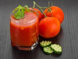 Gaspacho on wooden background photo