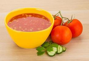 Gaspacho in a bowl on wooden background photo