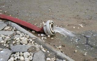 Extreme weather - water being pumped out of a flooded basement in Cologne, Germany, after heavy rain falls. photo