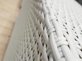 Close up photo of white artificial rattan wicker.