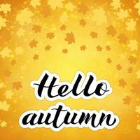 Calligraphy lettering Hello autumn written with brush on bright yellow and orange background. Falling leaves confetti. Autumn fall vector illustration.
