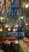 cafe at night with lights on it photo