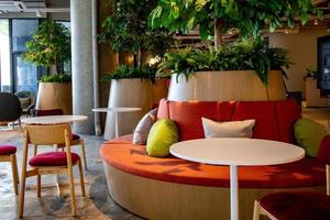 Area of Co-Working Space on social distancing with a luxury comfortable design for work as free and relax at True digital park , Thailand. Concept of creative cooperates workspace. photo
