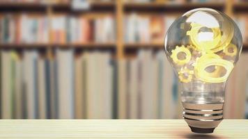 The gold gear in lightbulb for education or creative concept 3d rendering photo