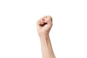 Woman's hands with fist gesture on a white background photo