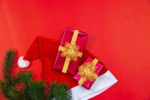 Christmas background concept. Top view of Christmas gift box with spruce branches photo