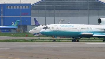 ALMATY, KAZAKHSTAN MAY 4, 2019 - Kazakhstan Kaz Air Trans Tupolev 154 UP T5401 taxiing before departure, Almaty International Airport, Kazakhstan video