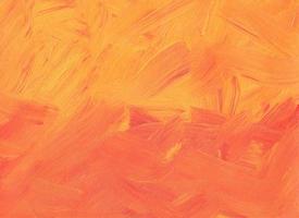 Abstract coral and peach color background painting. Orange and red textured brush strokes on paper backdrop. Contemporary art. photo