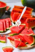 Watermelon slice on plate, Closeup sweet watermelon slices pieces fresh watermelon tropical summer fruit photo