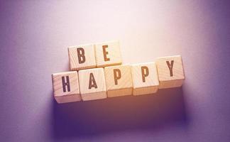 Be Happy Word with Wooden Cubes photo