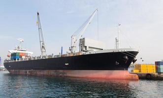 Cargo Ship in port photo