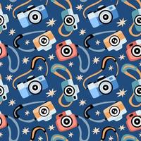 Seamless pattern with various photo cameras and stars vector