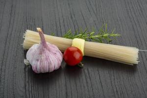 Rice noodles on wooden background photo