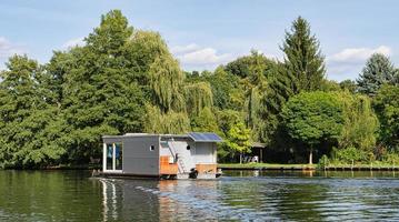 with the houseboat on the river Dahme in Brandenburg. relaxed sailing with the boat. photo