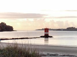 The lighthouse of Cabanas beach photo