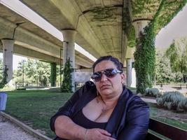 Young woman on the bench photo