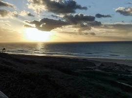 The beginning of sunset on Doninos beach photo