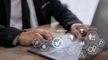 Business process management concept. Businessman touch on virtual innovation Operations management gears icons, High quality control , Problem solving, workflow, monitoring and innovation. photo