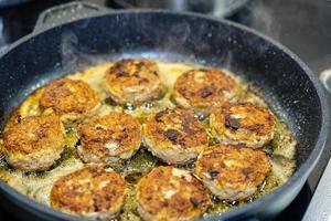 Fried meatballs with boiled cauliglower and parsley potatoes photo