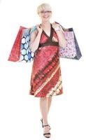 happy young adult women  shopping with colored bags photo