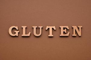 Gluten text on paper background photo